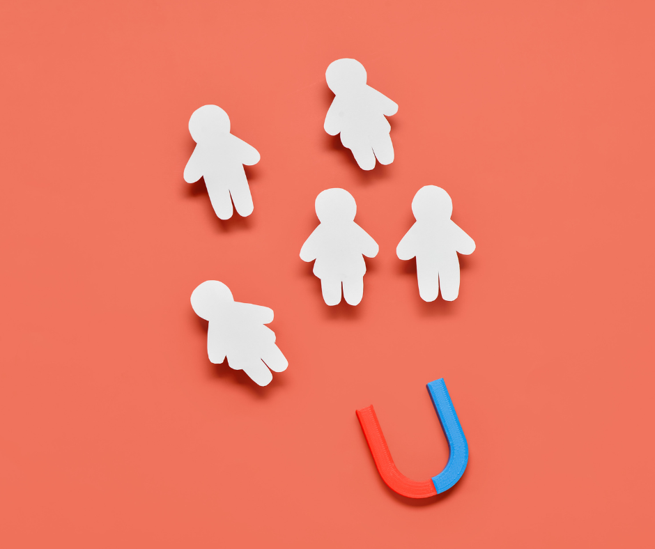 The picture shows cut-outs of children to represent student retention.