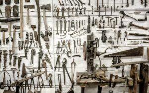 The picture shows a wall of tools to represent the tools institutions need to examine their financial condition.