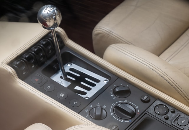 The picture shows a car's gearshift to represent the shift in conversation to ROI.